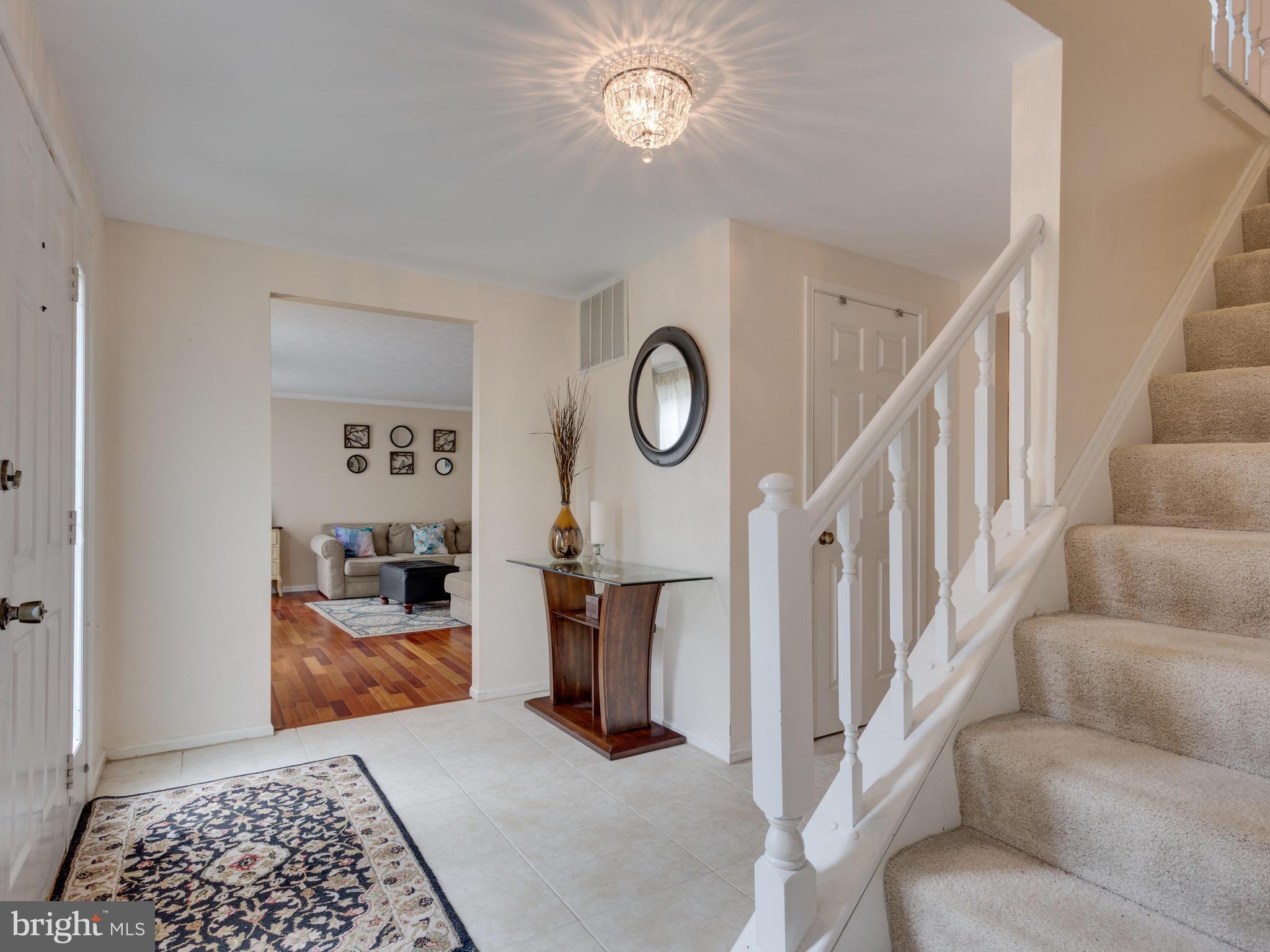 7817 Roundabout Way Springfield, VA 22153 - Photo 2 of 30 a view of entryway and hall