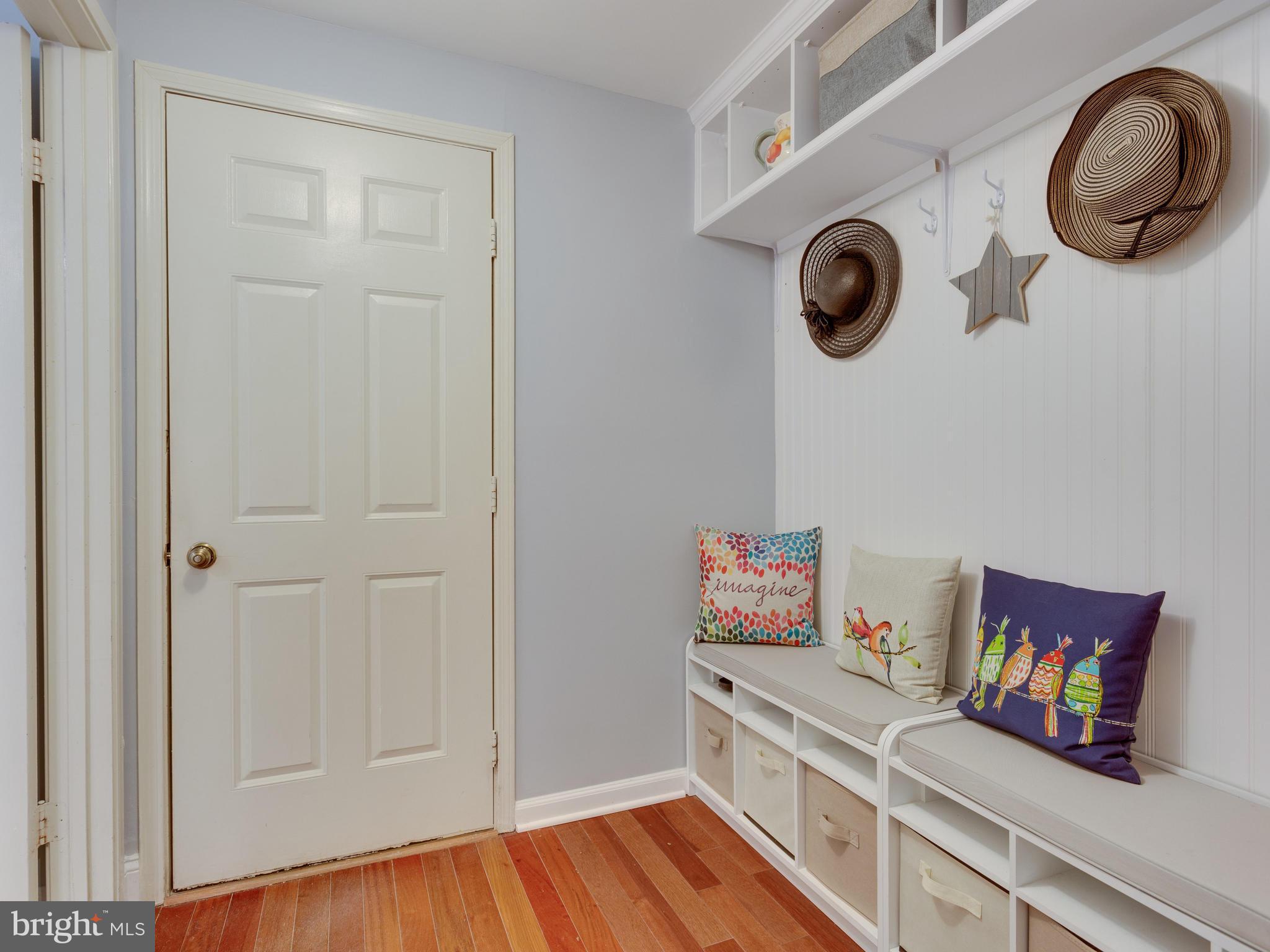 7817 Roundabout Way Springfield, VA 22153 - Photo 11 of 30 a view of kitchen with cabinets and wooden floor
