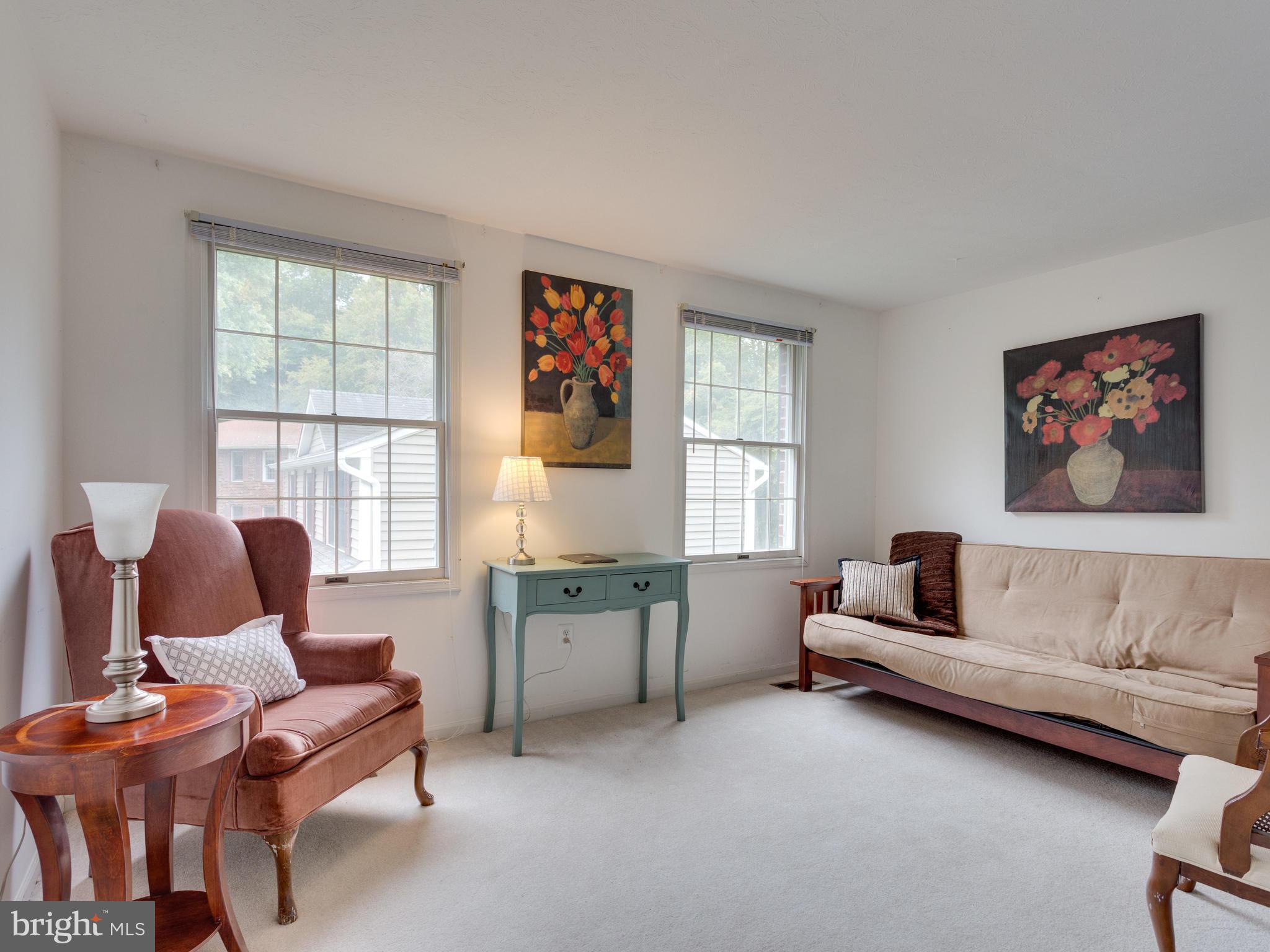 7817 Roundabout Way Springfield, VA 22153 - Photo 19 of 30 a living room with furniture and a window