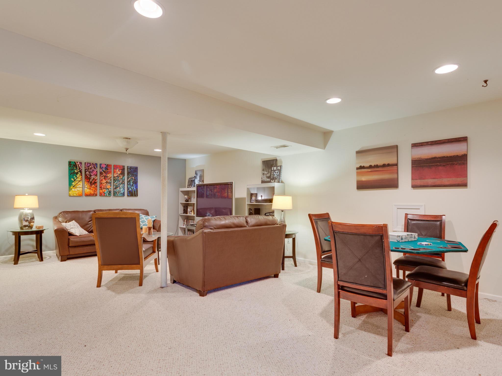 7817 Roundabout Way Springfield, VA 22153 - Photo 22 of 30 a living room with furniture and a work place