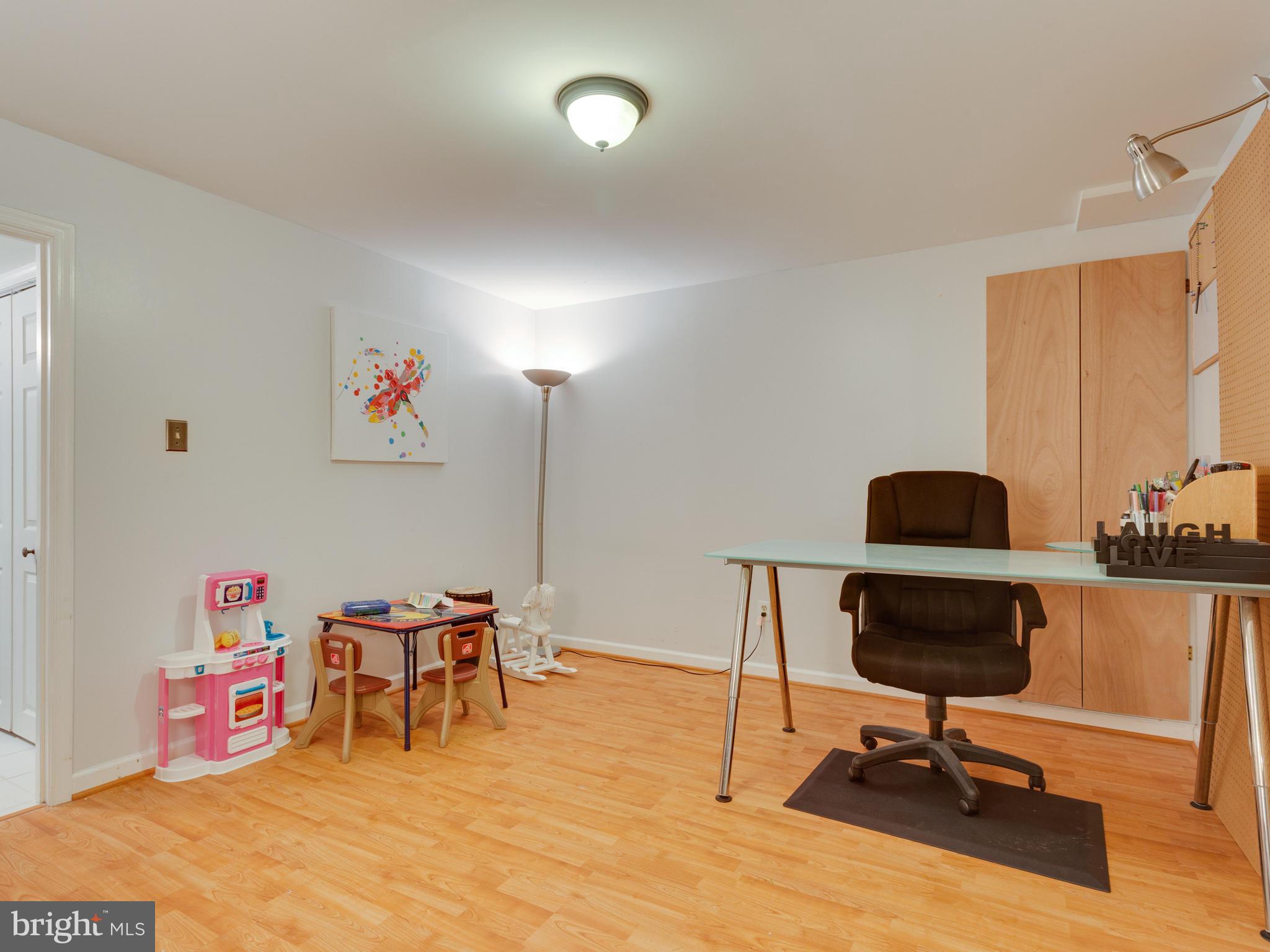 7817 Roundabout Way Springfield, VA 22153 - Photo 23 of 30 a workspace with furniture and rug