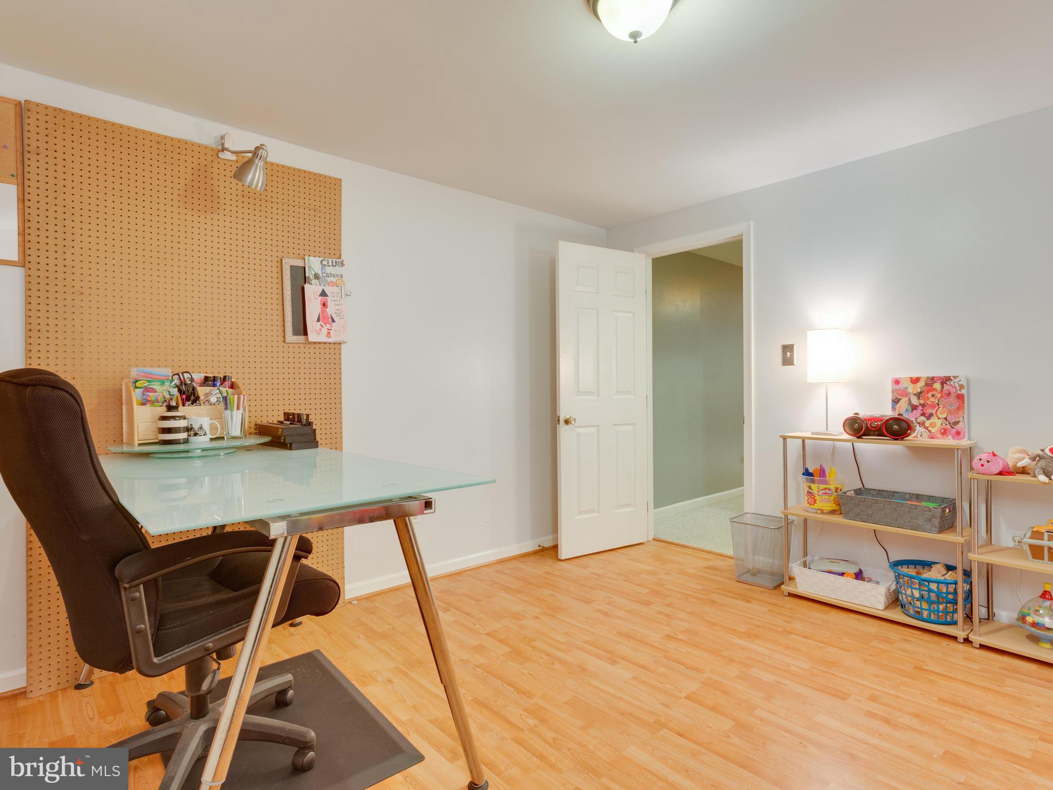 7817 Roundabout Way Springfield, VA 22153 - Photo 24 of 30 a workspace with furniture and wooden floor