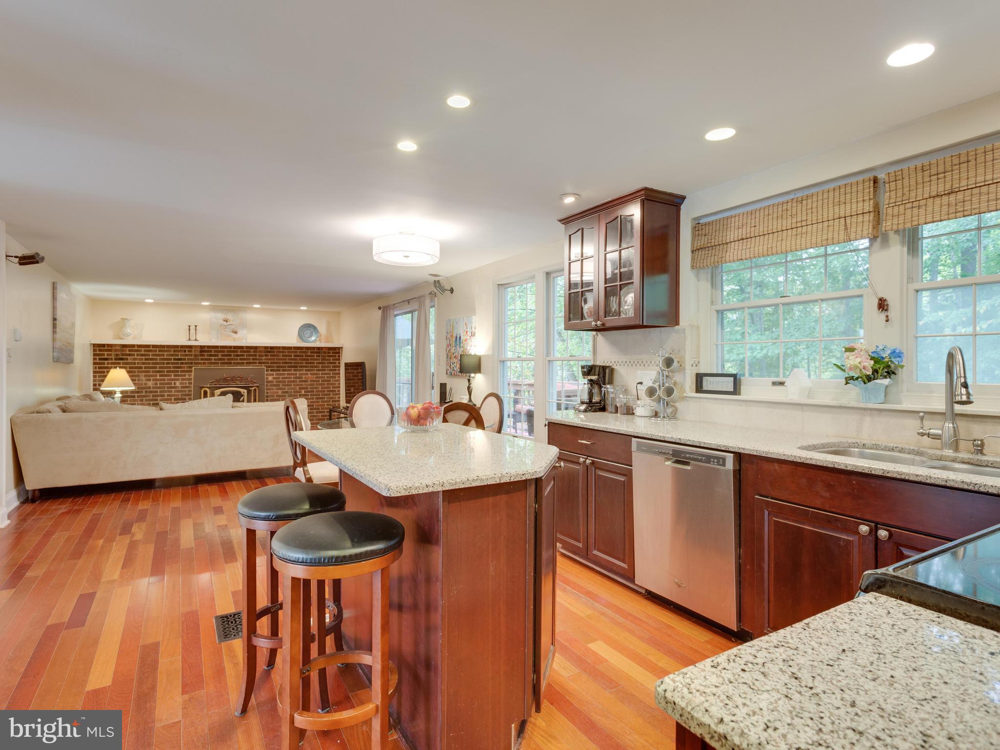 7817 Roundabout Way Springfield, VA 22153 - Photo 8 of 30 a kitchen with a sink cabinets and window