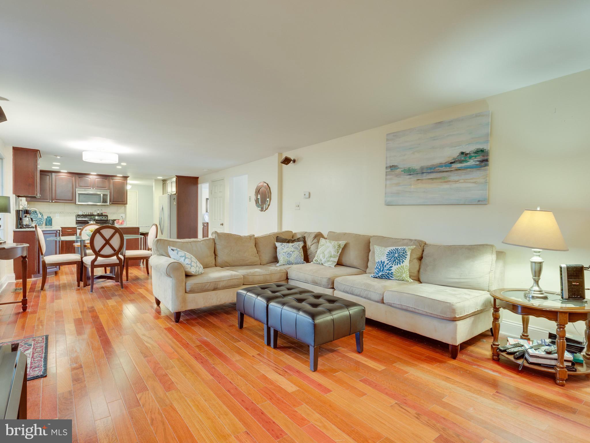 7817 Roundabout Way Springfield, VA 22153 - Photo 10 of 30 a living room with furniture and a wooden floor