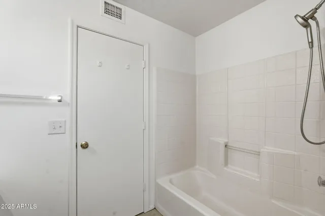 a bathroom with a bathtub