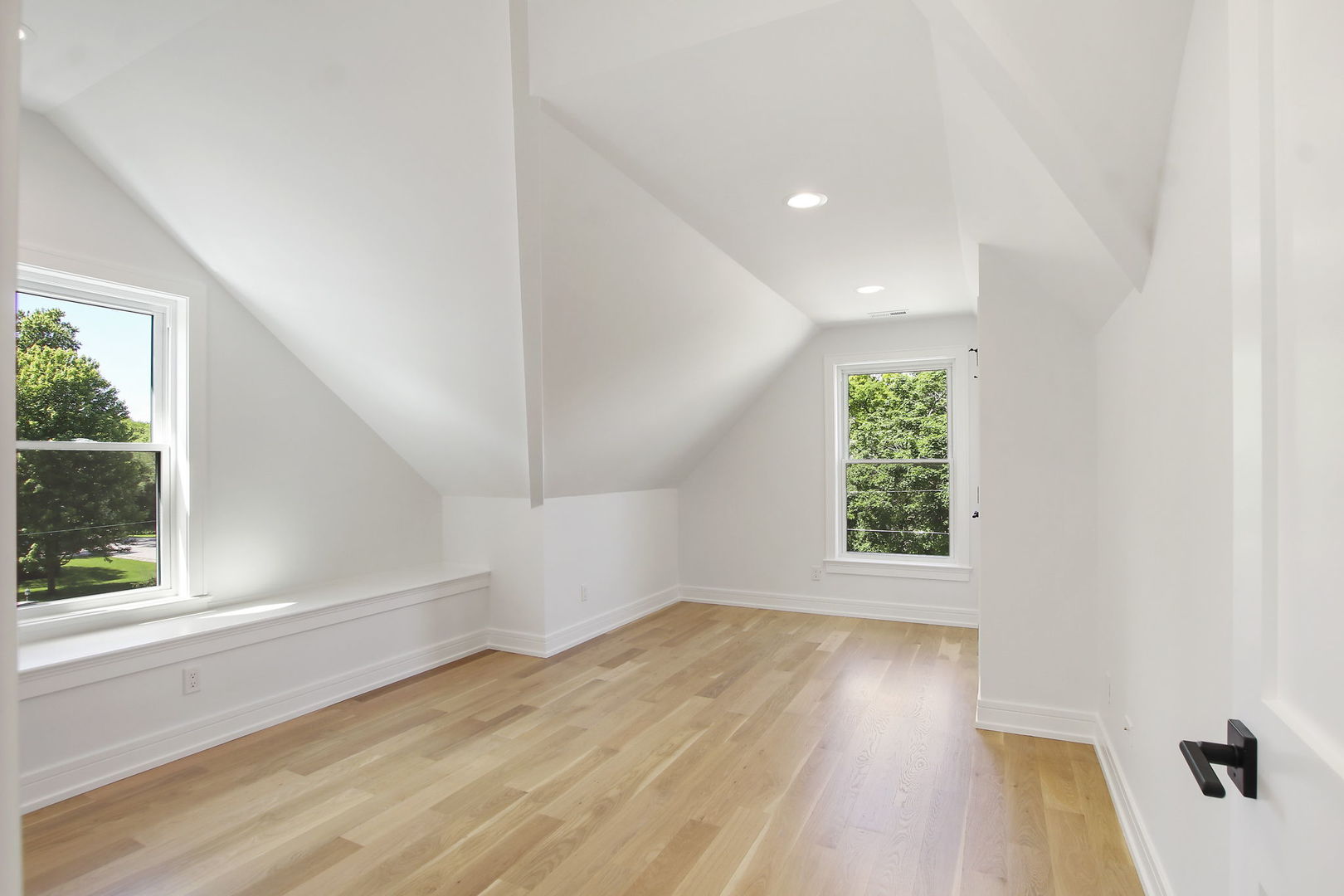 N1812 Hillside Road Linn, WI 53147 - Photo 34 of 52 an empty room with wooden floor and windows