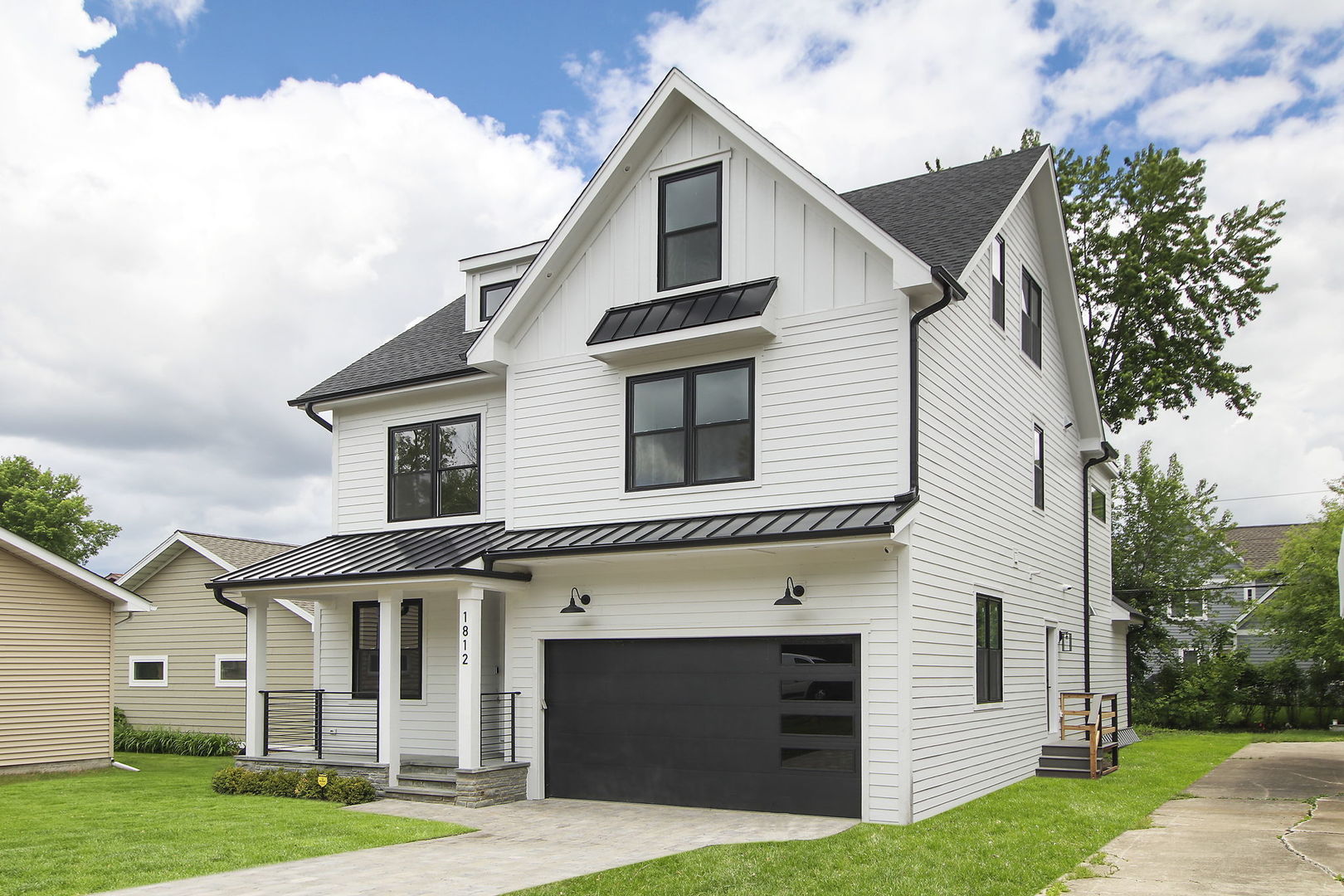 N1812 Hillside Road Linn, WI 53147 - Photo 48 of 52 a front view of a house with a yard and garage
