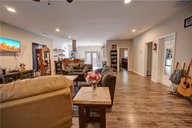 a bathroom with a sink toilet and a mirror