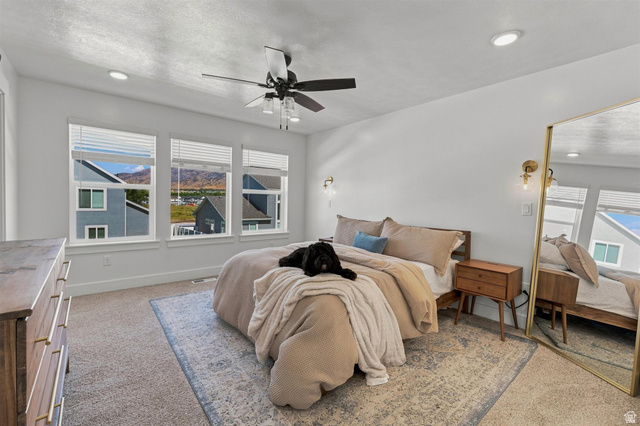 355 West 3085 South Logan, UT 84321 - Photo 21 of 40 White walls with recessed lighting and a ceiling fan