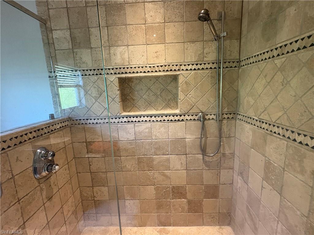 804 Bluebird Street Naples, FL 34104 - Photo 3 of 42 Full bath with tiled shower