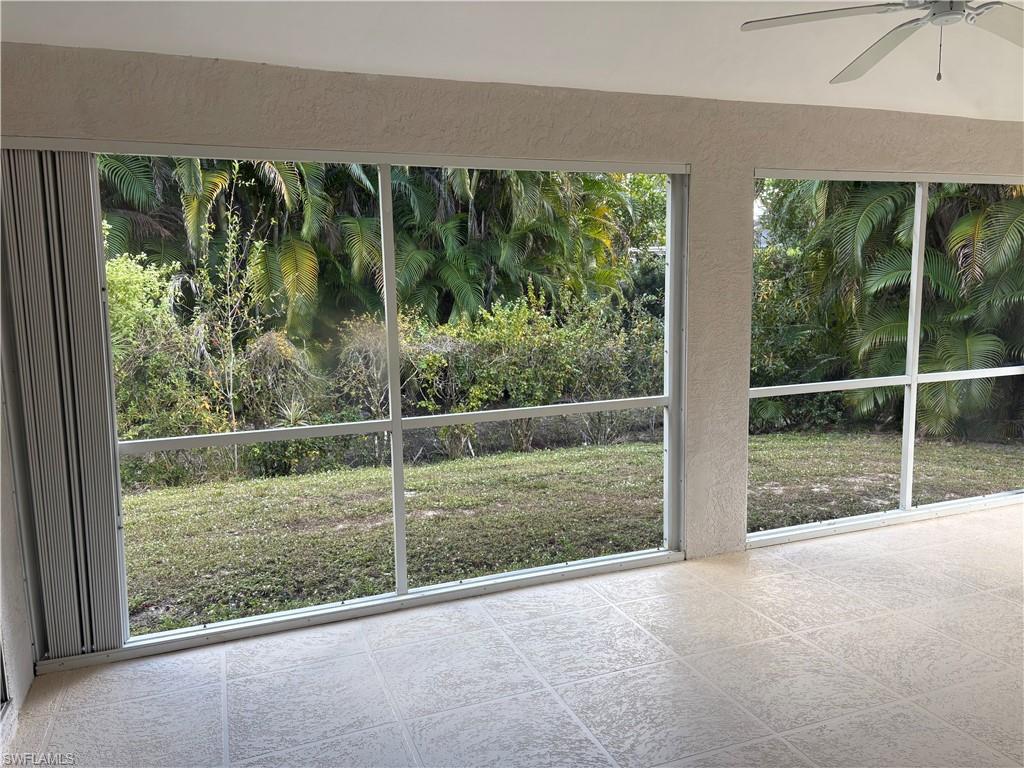 804 Bluebird Street Naples, FL 34104 - Photo 32 of 42 View of unfurnished sunroom