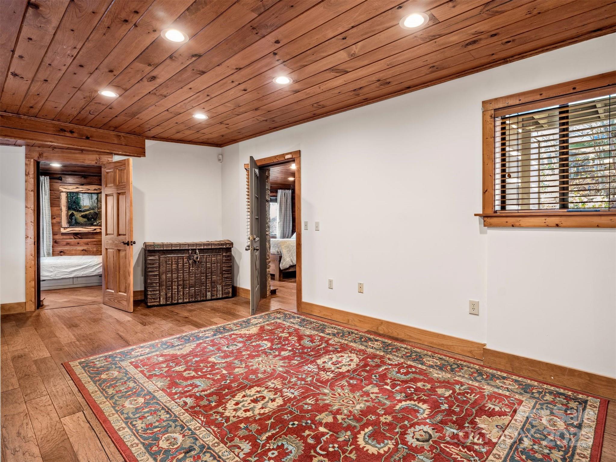 135 Grouse Point Road Maggie Valley, NC 28751 - Photo 33 of 48 a big room with wooden floor