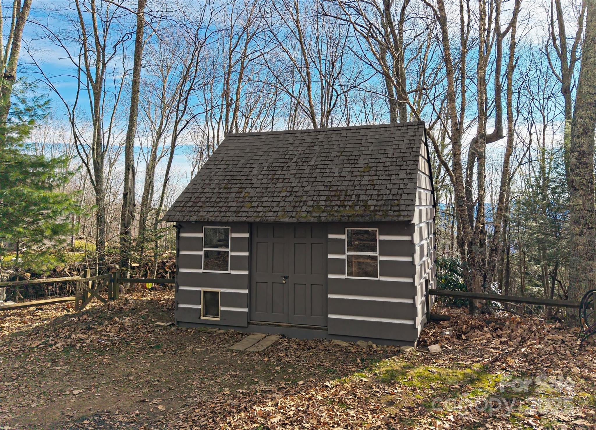 135 Grouse Point Road Maggie Valley, NC 28751 - Photo 39 of 48 a front view of a house with a yard