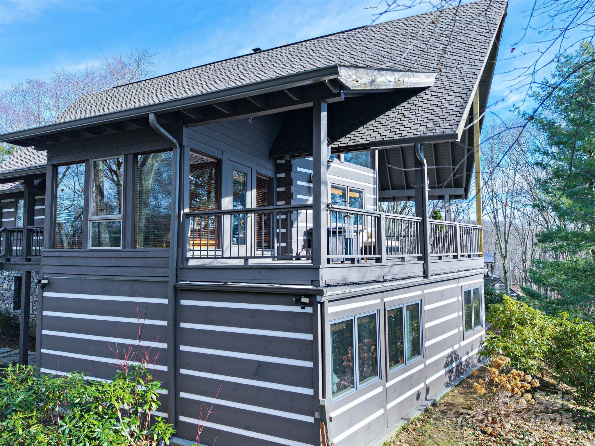 135 Grouse Point Road Maggie Valley, NC 28751 - Photo 44 of 48 a front view of a house with a porch
