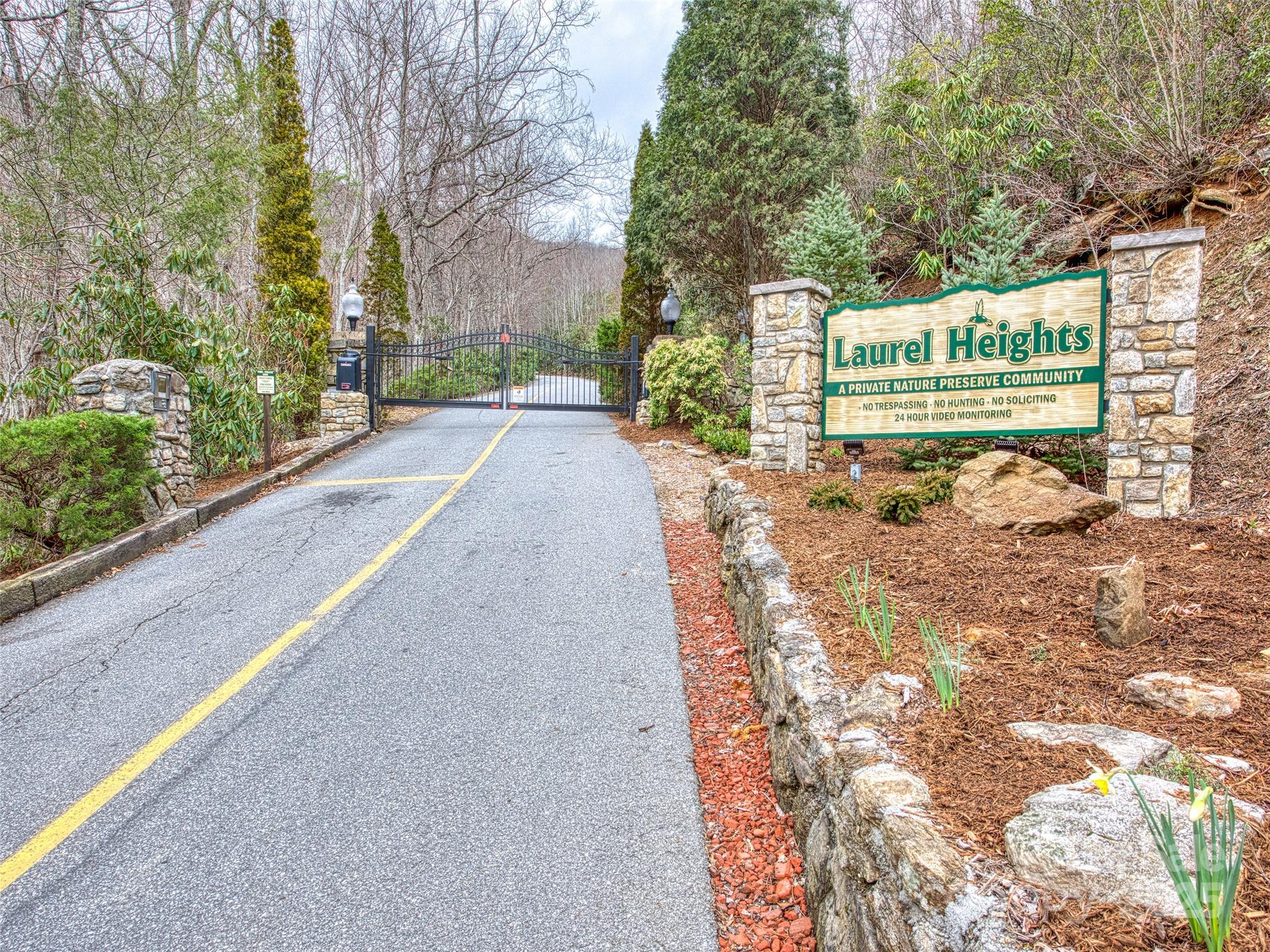 135 Grouse Point Road Maggie Valley, NC 28751 - Photo 47 of 48 a view of a street with trees