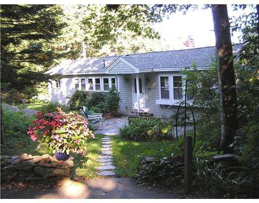 123 Sawyer's Island Road Boothbay, ME 04537 - Photo 14 of 14 Exterior Back. Stone pathway to...