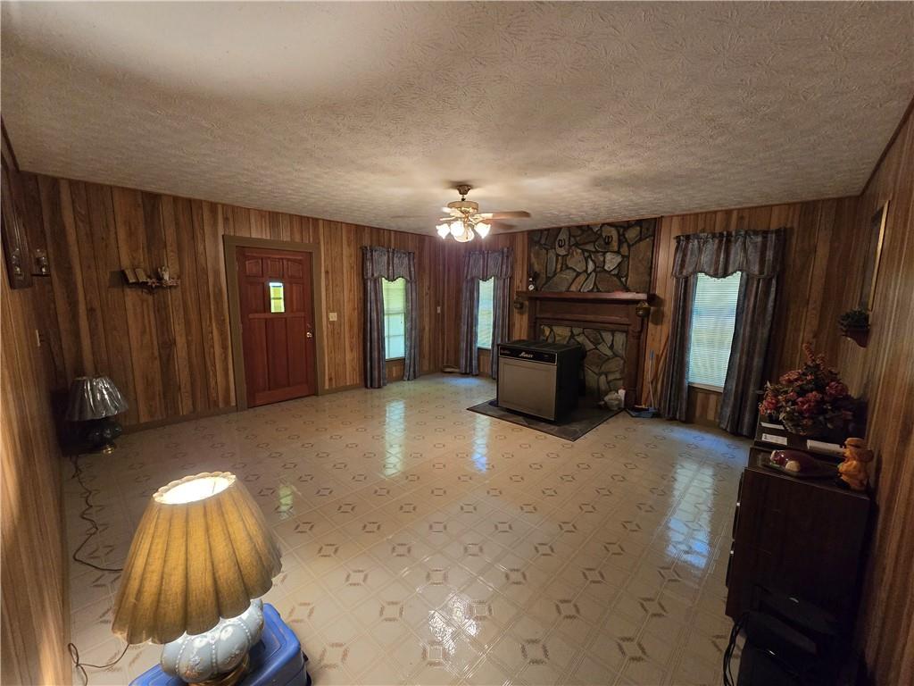 11953 Henderson Mountain Road Fairmount, GA 30139 - Photo 46 of 46 a view of a livingroom with furniture and chandelier fan