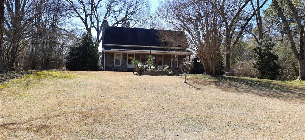 11953 Henderson Mountain Road Fairmount, GA 30139 - Photo 5 of 46 a view of outdoor space yard and house