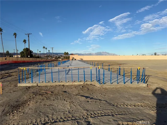 a view of ocean with large building