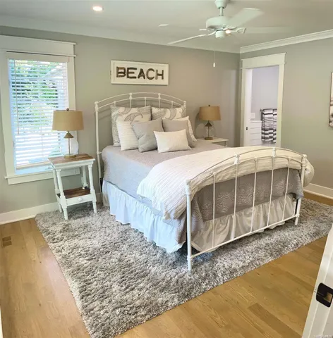 a bedroom with a bed and a table in it