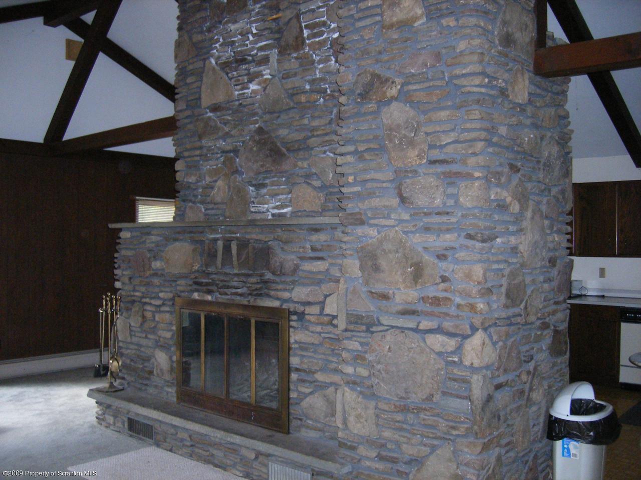 252 Lane Hill Road Tunkhannock, PA 18657 - Photo 4 of 8 a stove top oven sitting inside of a kitchen