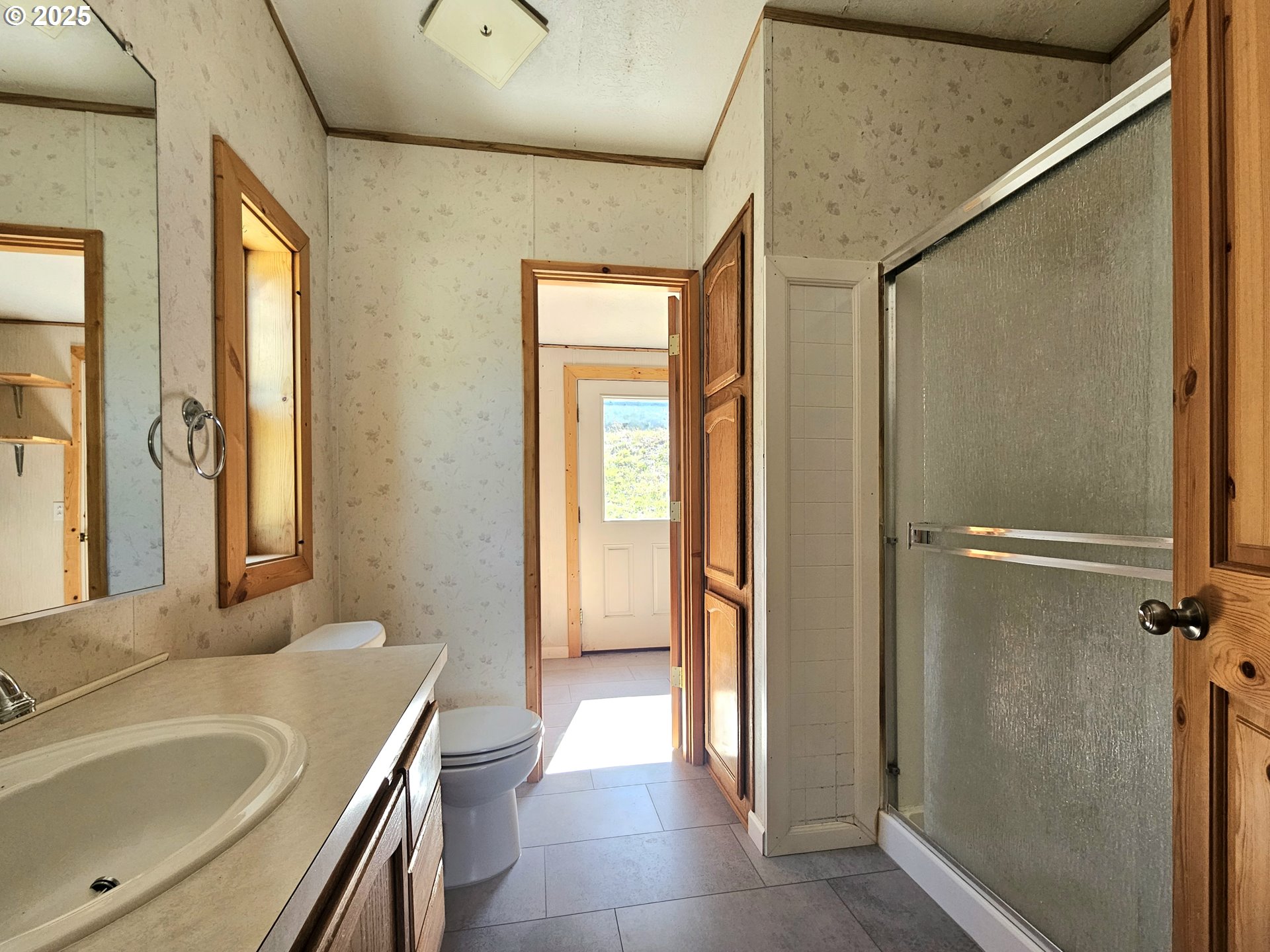 Undisclosed Address Brookings, OR 97415 - Photo 13 of 13 a bathroom with a sink and a tub