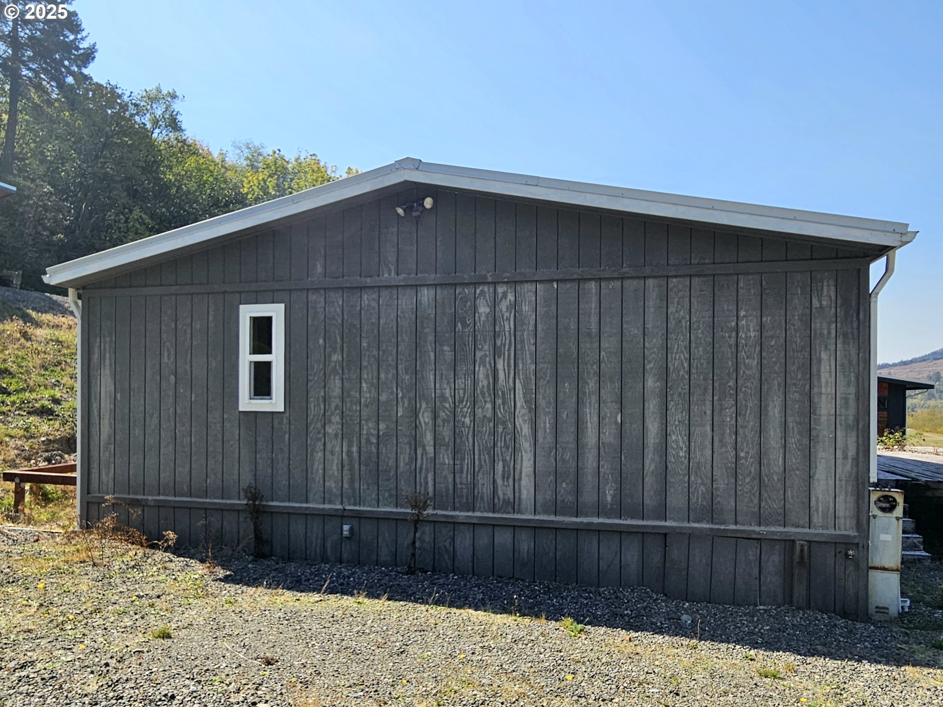 Undisclosed Address Brookings, OR 97415 - Photo 2 of 13 a backyard of a house