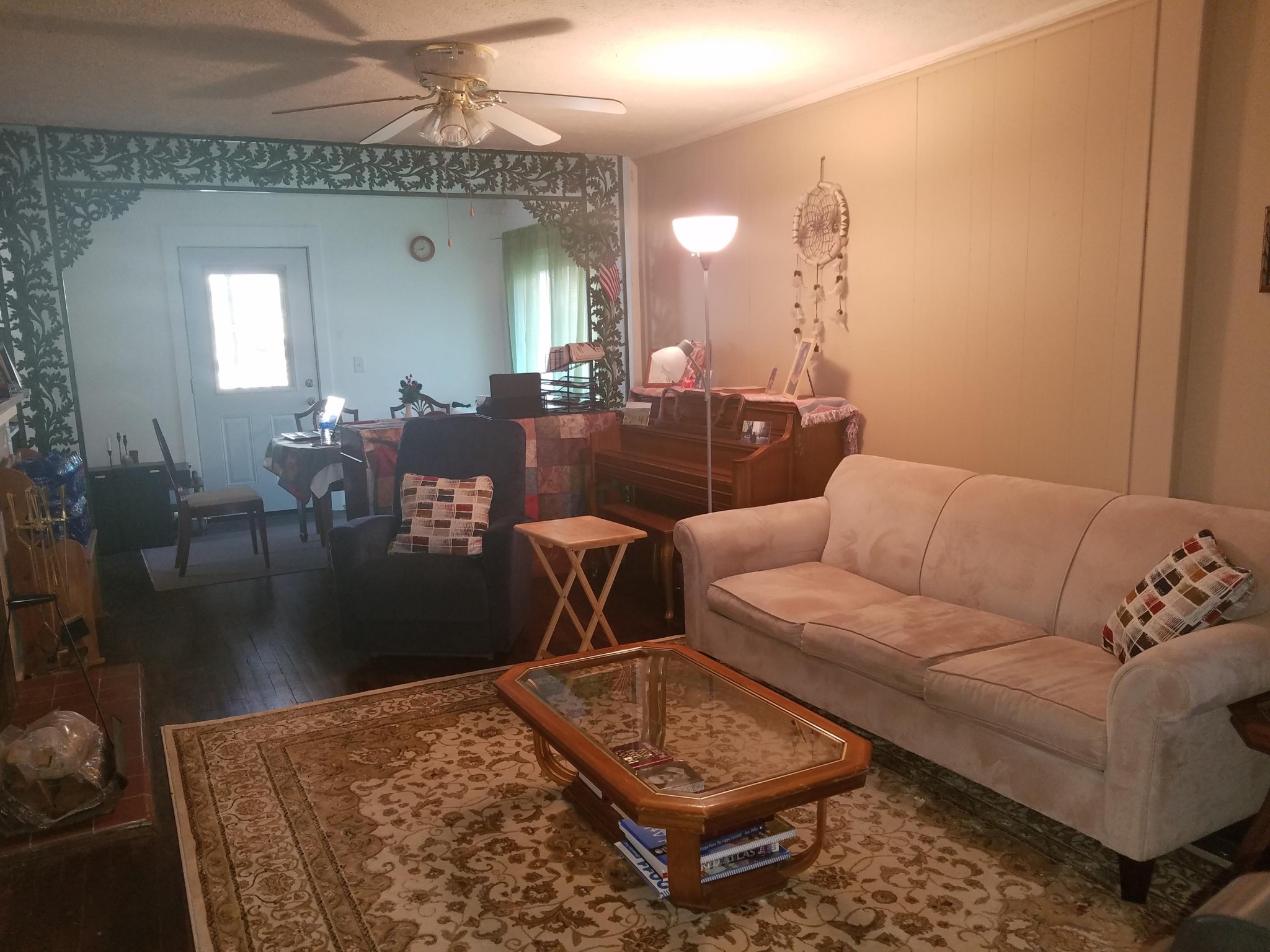 109 Tucker Road Oak Ridge, TN 37830 - Photo 14 of 20 a living room with furniture and a chandelier