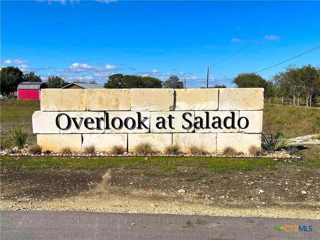 991 Inka Road Salado, TX 76571 - Photo 5 of 5 a view of outdoor space with signage and flags