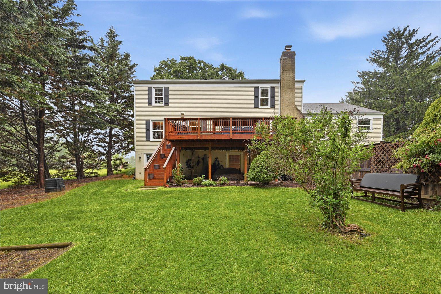 911 Riva Ridge Drive Great Falls, VA 22066 - Photo 53 of 55 Charming backyard retreat with deck.