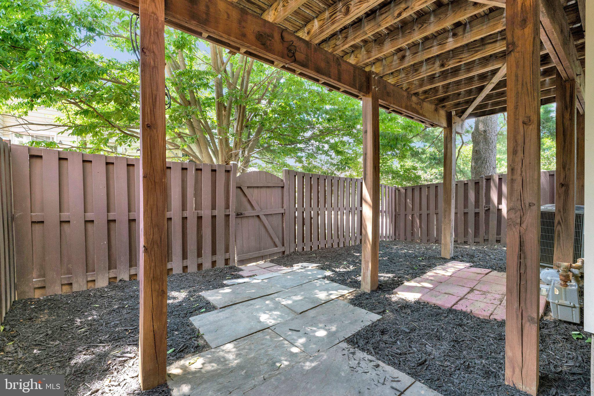 2000 Gallows Tree Lane Vienna, VA 22182 - Photo 49 of 58 a view of a backyard with fence