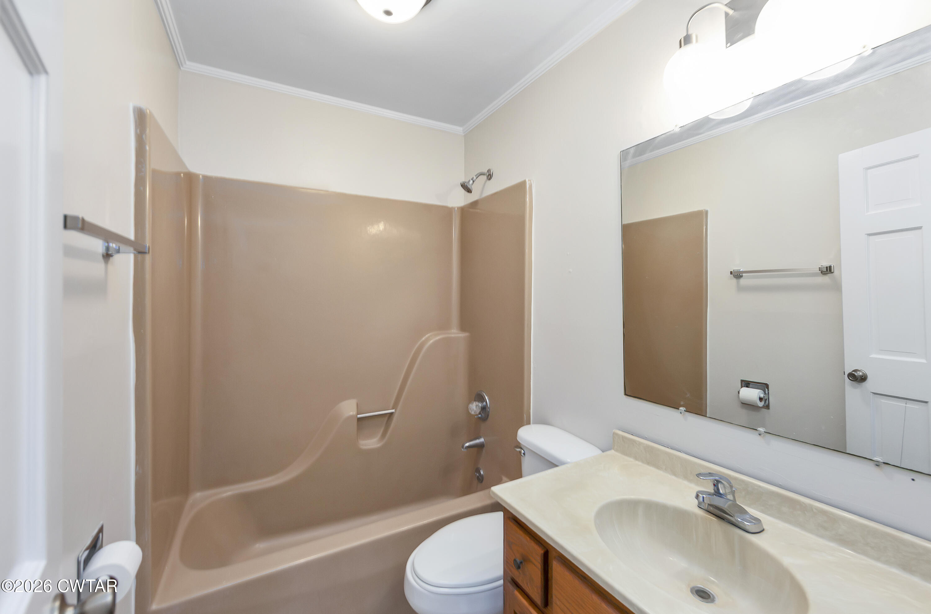 192 New Salem Road Bethel Springs, TN 38315 - Photo 16 of 32 a bathroom with a sink a toilet and shower