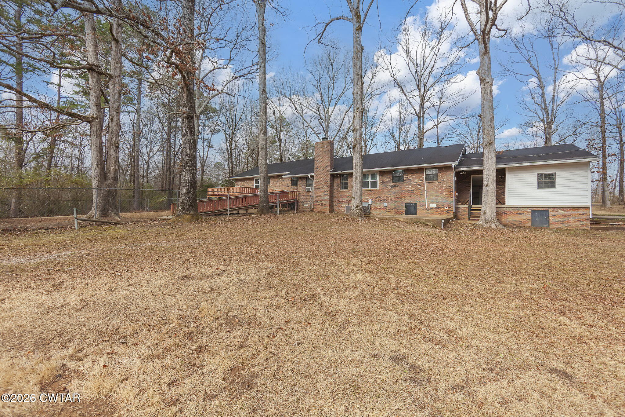 192 New Salem Road Bethel Springs, TN 38315 - Photo 26 of 32 a view of a house with a large tree in front of it