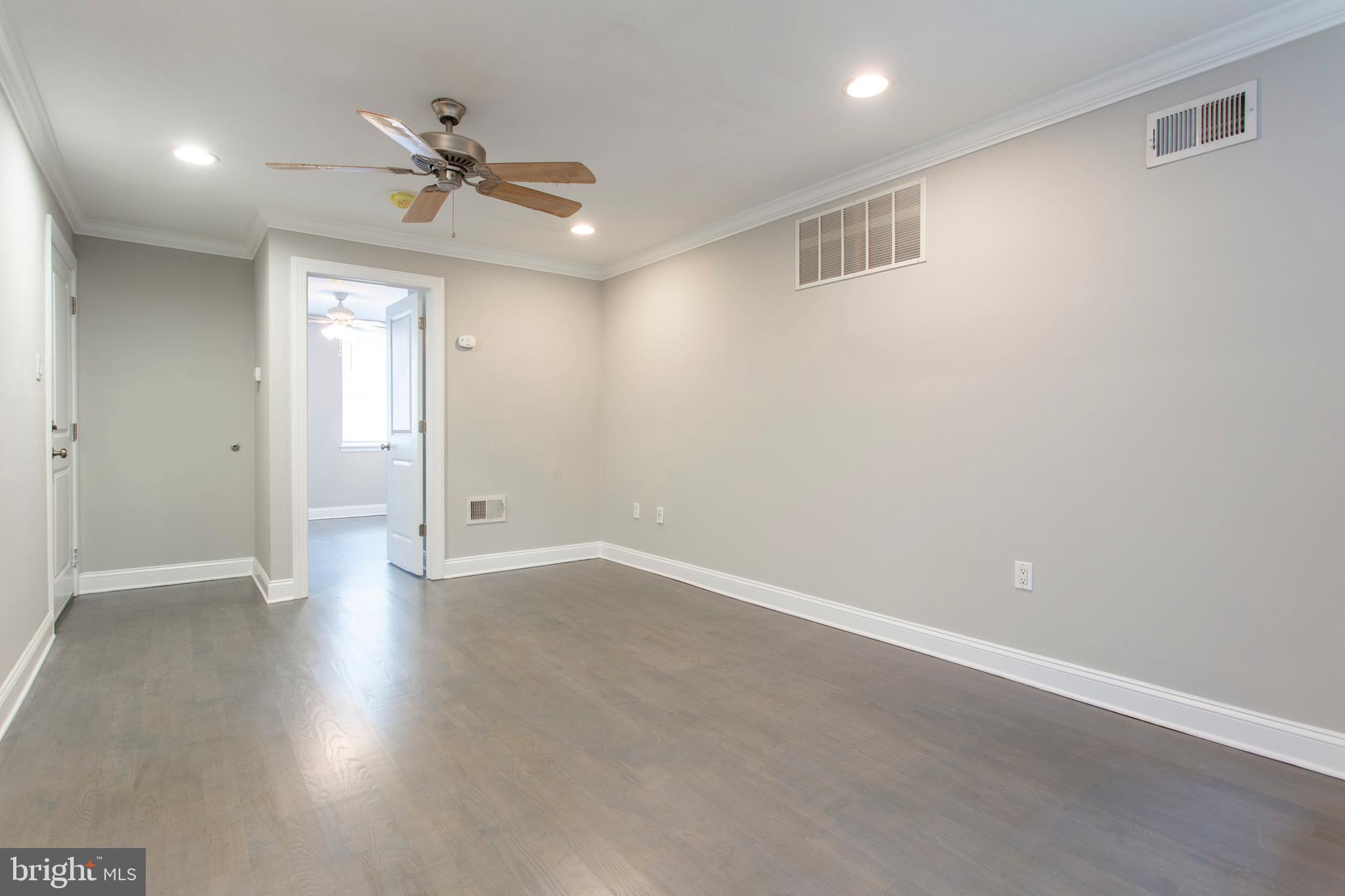 763 South 15th Street, Unit 1 Philadelphia, PA 19146 - Photo 6 of 18 Living Room looking town Front Bedroom