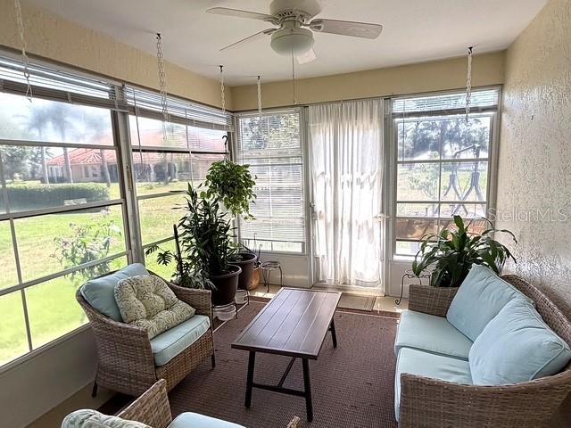 1629 Willow Run Sebring, FL 33872 - Photo 11 of 16 a living room with furniture and a large window