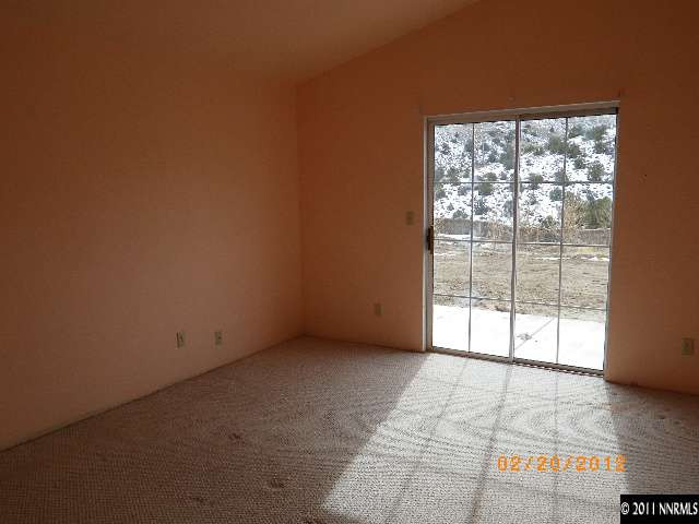 3230 Outback Lane Reno, NV 89510 - Photo 6 of 13 a view of an empty room with a window