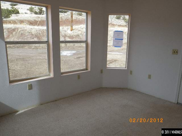 3230 Outback Lane Reno, NV 89510 - Photo 9 of 13 an empty room with a window