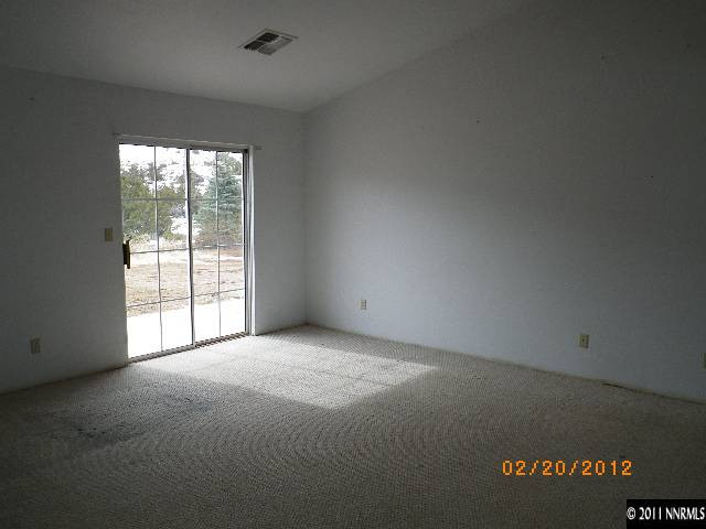 3230 Outback Lane Reno, NV 89510 - Photo 10 of 13 an empty room with windows