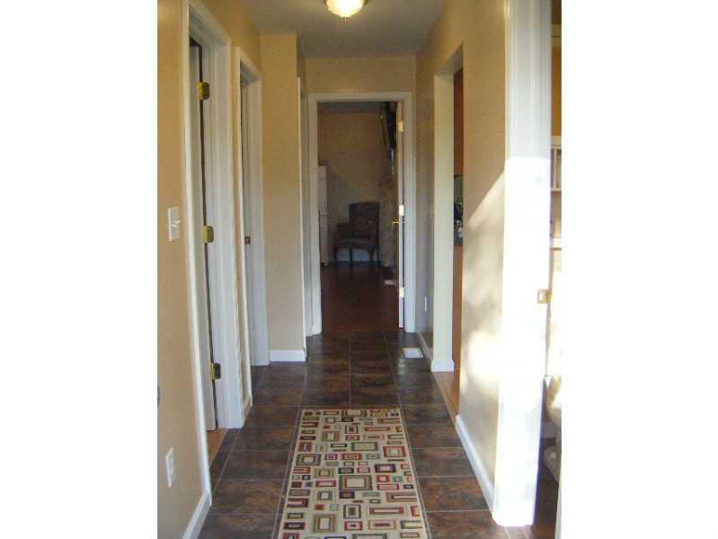 348 Mushrush Road Butler, PA 16002 - Photo 8 of 25 Other. Hallway to bedrooms, main floor bath, downstairs family room, and outside