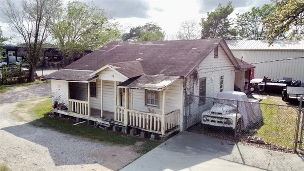 a view of a house with a couches in a patio