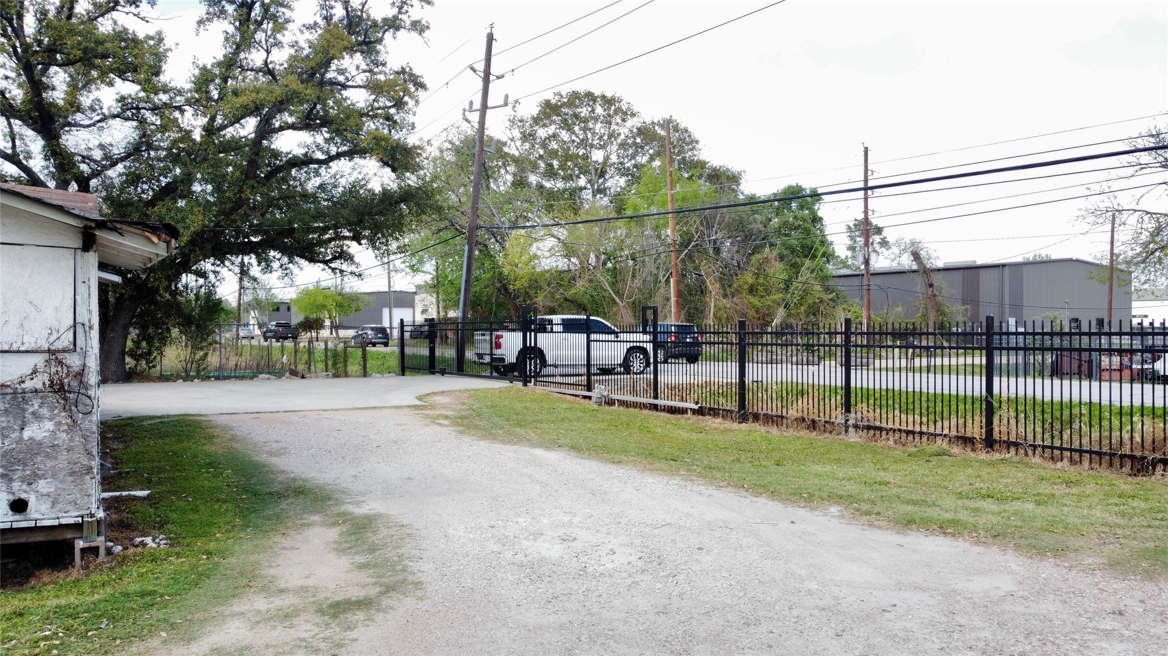 6951 Windfern Road Houston, TX 77040 - Photo 7 of 8 a view of a park with swings and slides