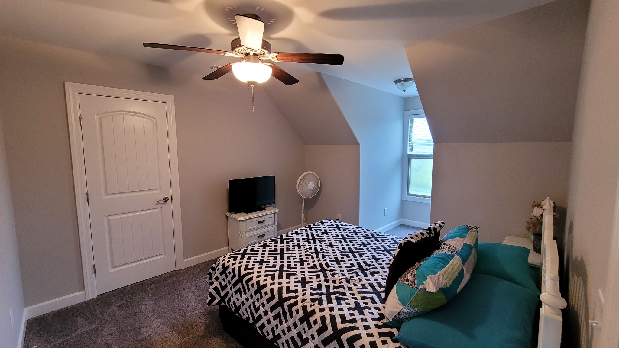 2710 Union Road White House, TN 37188 - Photo 14 of 25 a bedroom with a bed and a chandelier