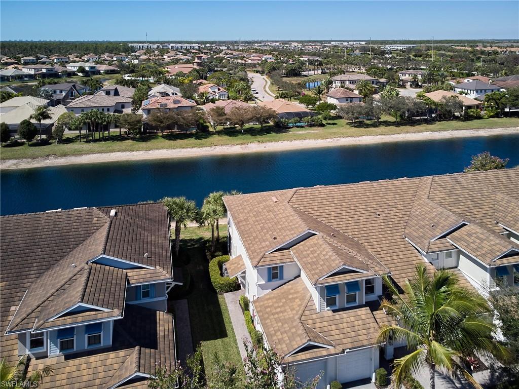 2319 Sawyers Hill Road, Unit 701 Naples, FL 34120 - Photo 22 of 36 an aerial view of a house with a ocean view