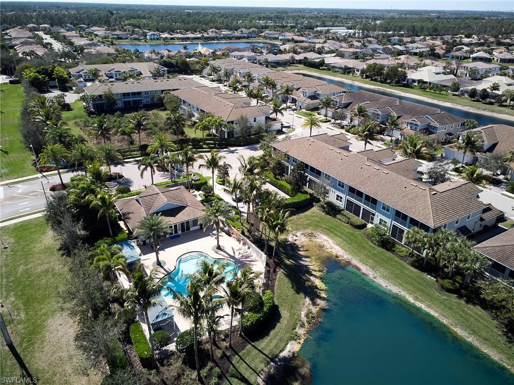 2319 Sawyers Hill Road, Unit 701 Naples, FL 34120 - Photo 26 of 36 an aerial view of a city with lots of residential buildings
