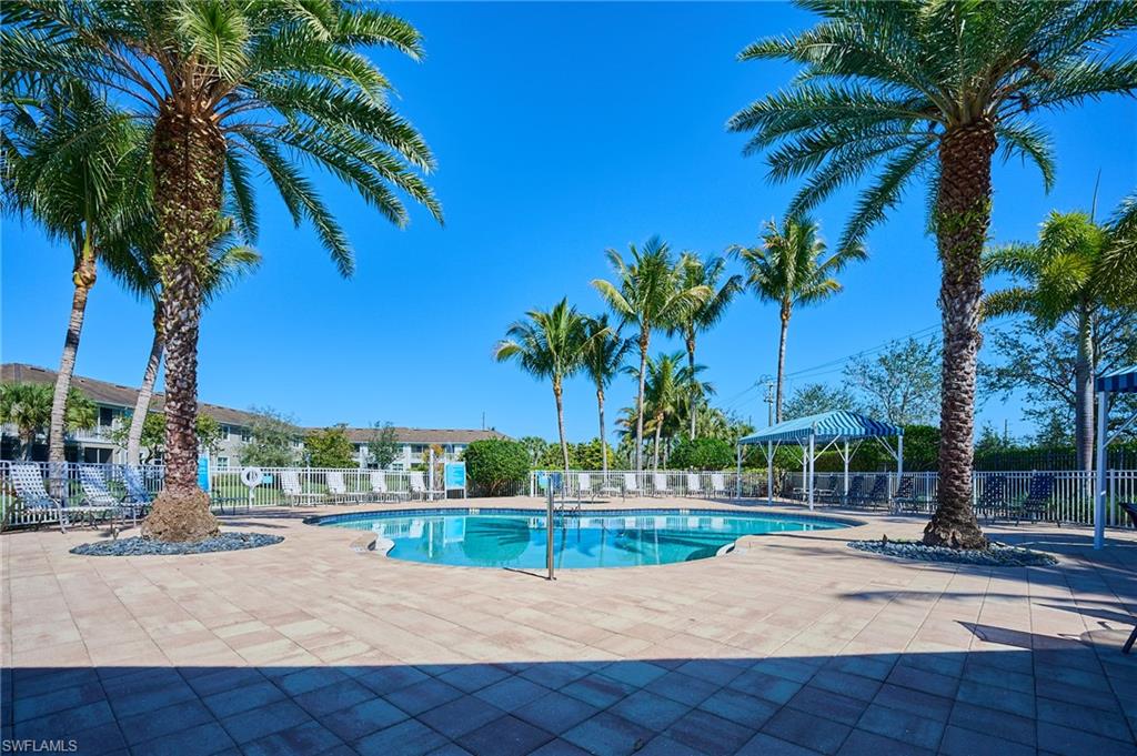 2319 Sawyers Hill Road, Unit 701 Naples, FL 34120 - Photo 34 of 36 a view of a park with palm trees