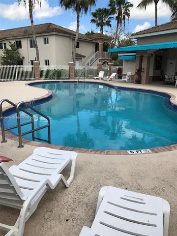 a view of a patio with chair and table