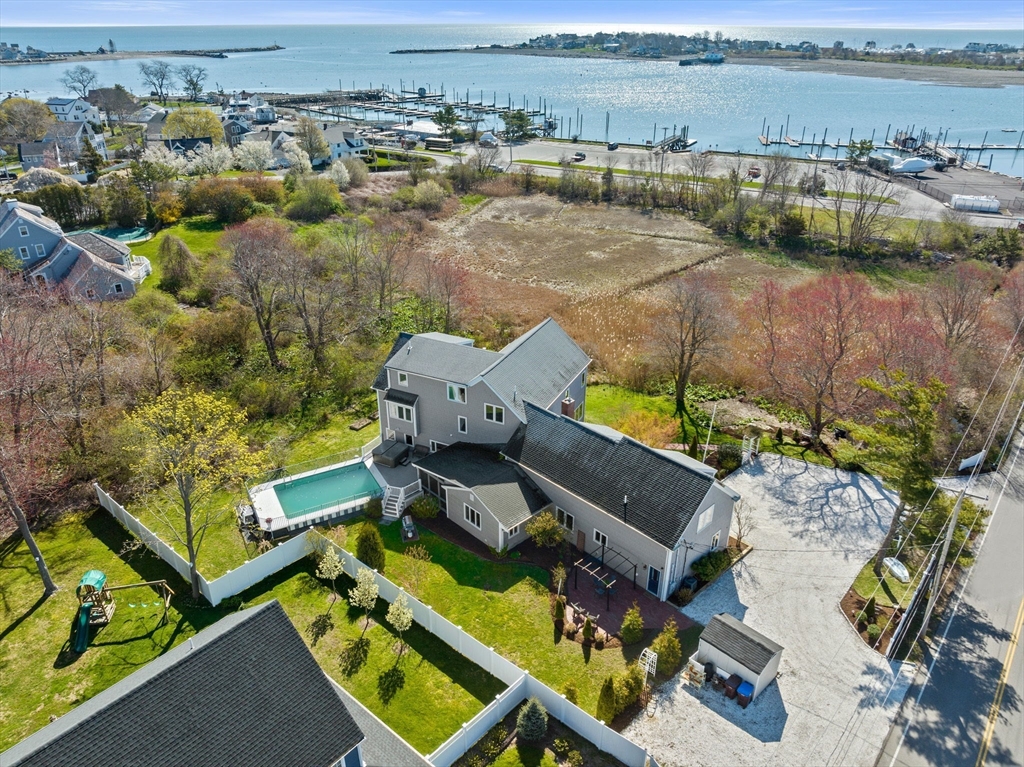 18 Hatherly Road Scituate, MA 02066 - Photo 2 of 42 an aerial view of a house with a lake view