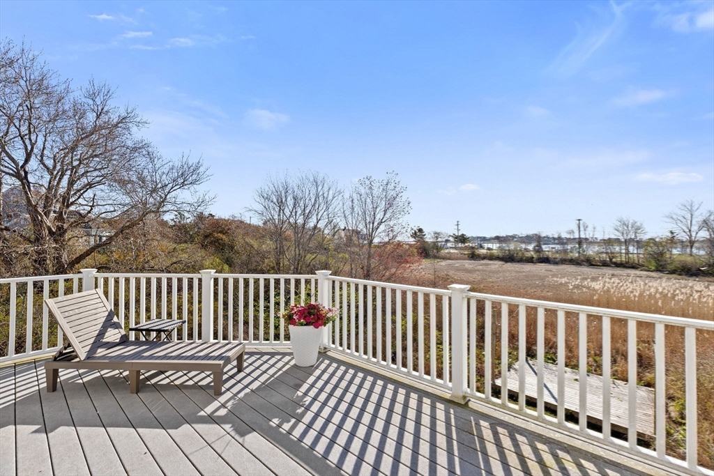 18 Hatherly Road Scituate, MA 02066 - Photo 21 of 42 a view of balcony with wooden floor and fence