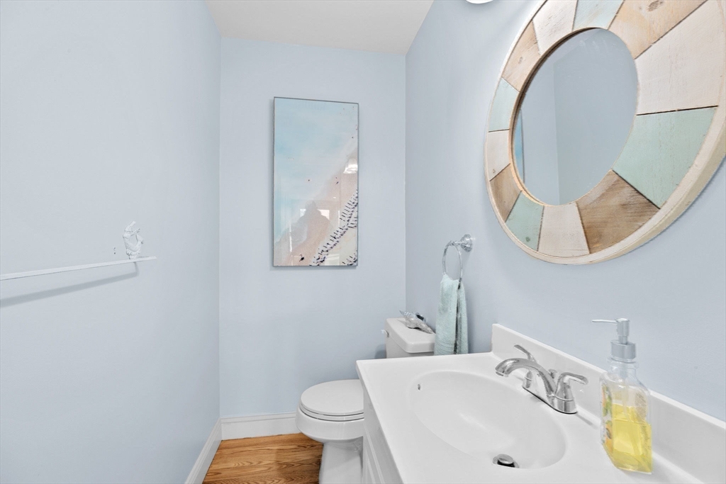 18 Hatherly Road Scituate, MA 02066 - Photo 24 of 42 a bathroom with a sink and a mirror