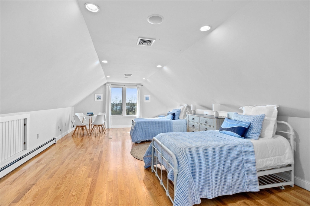 18 Hatherly Road Scituate, MA 02066 - Photo 27 of 42 a spacious bedroom with two beds and a couch